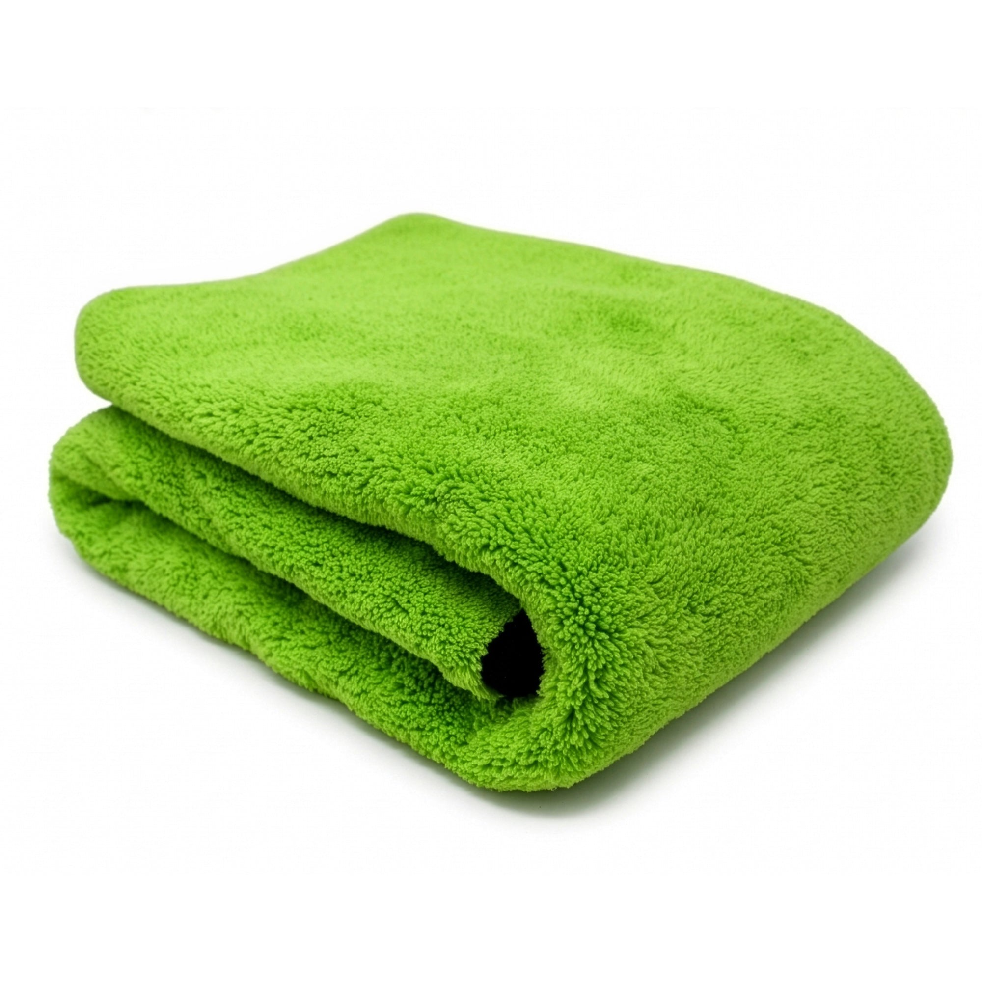 Green microfiber cleaning cloths, stack of soft reusable towels for car and home surfaces
